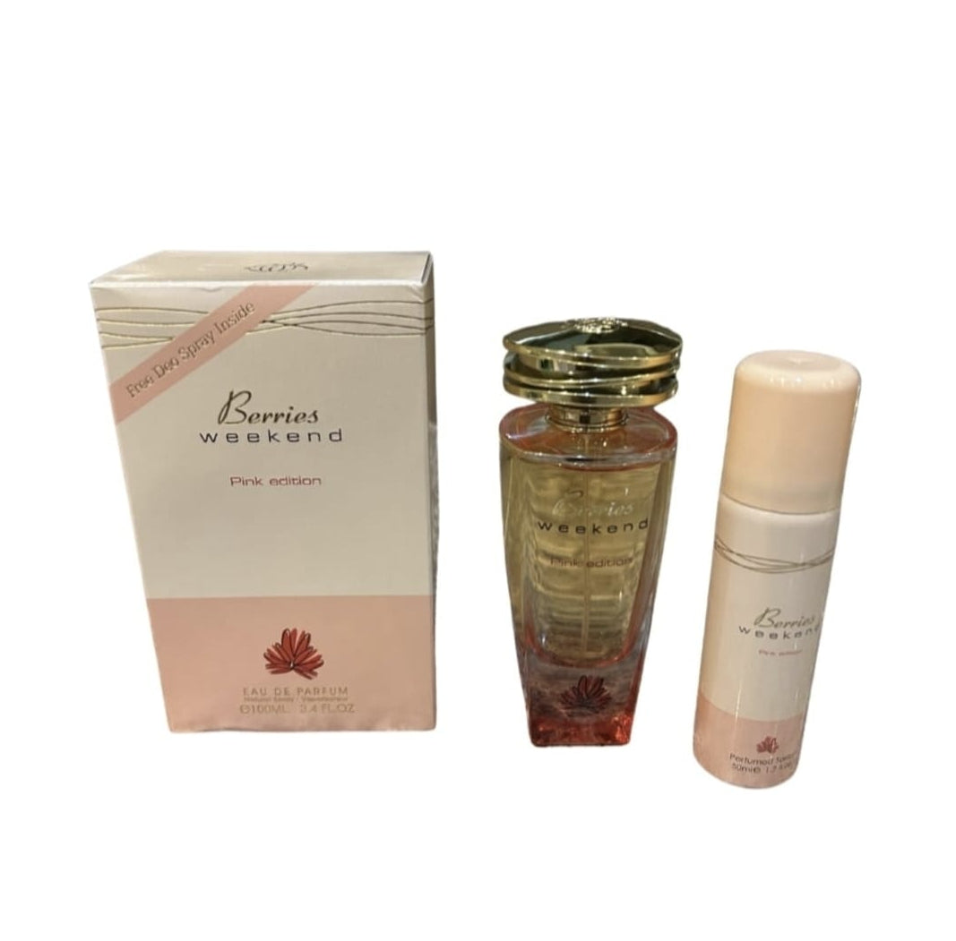 Perfume set with 'Berries Weekend' packaging on a white background