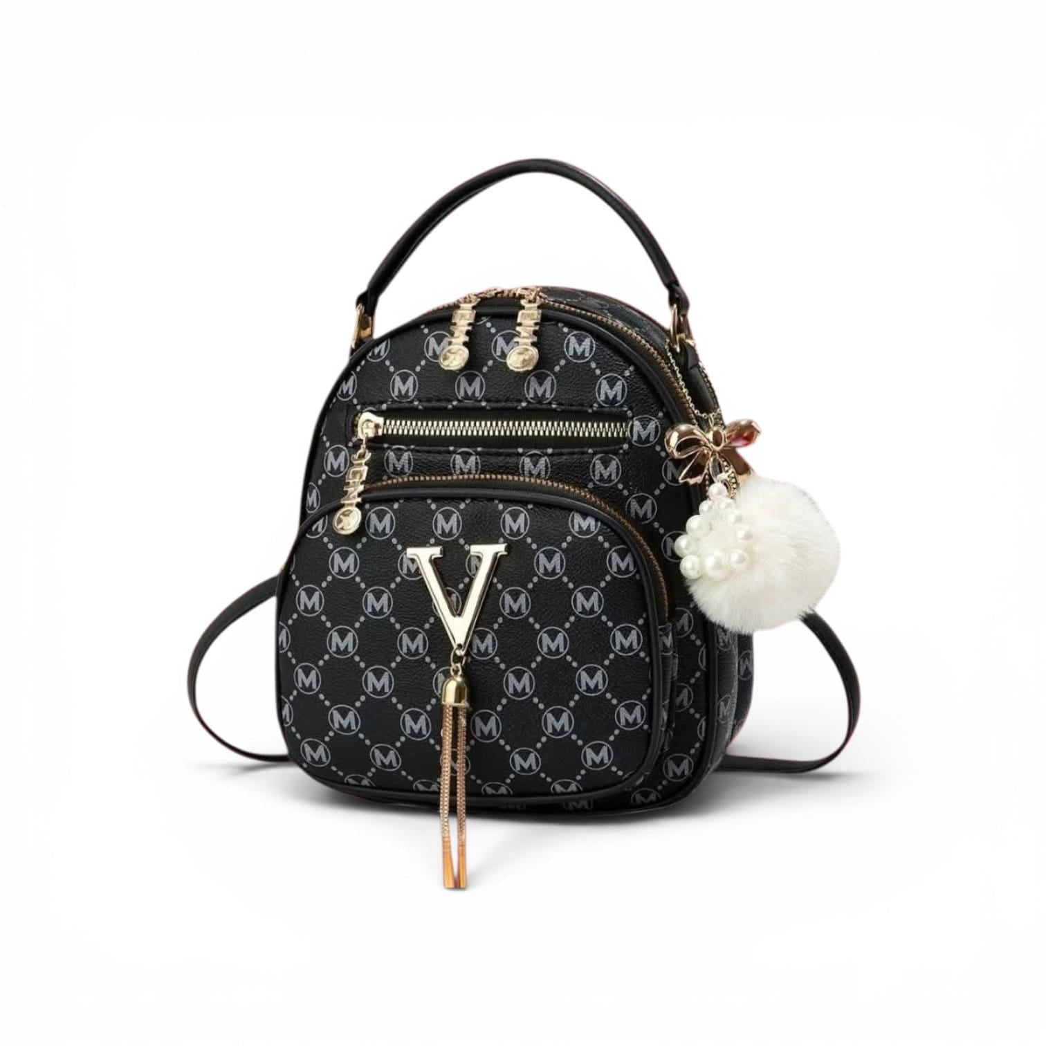 A black monogram mini backpack with gold-tone hardware, featuring a prominent 'V' logo on the front, a white pom-pom charm, and a top handle, shown on a plain white background.