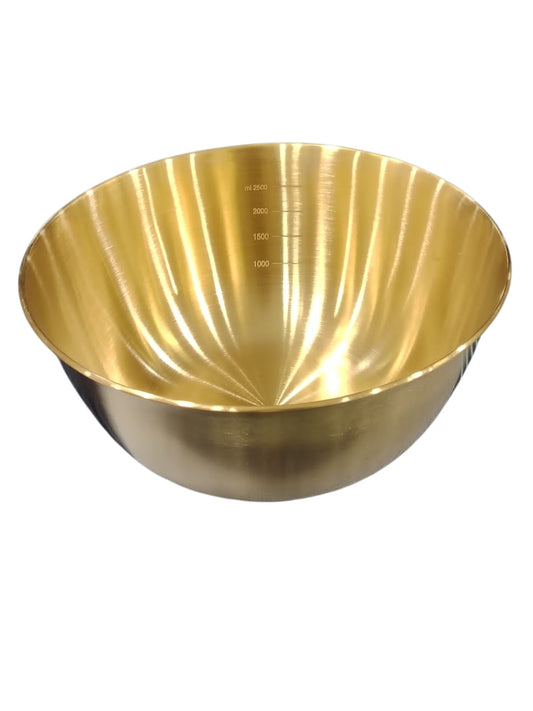 Gold metal bowl on a white background