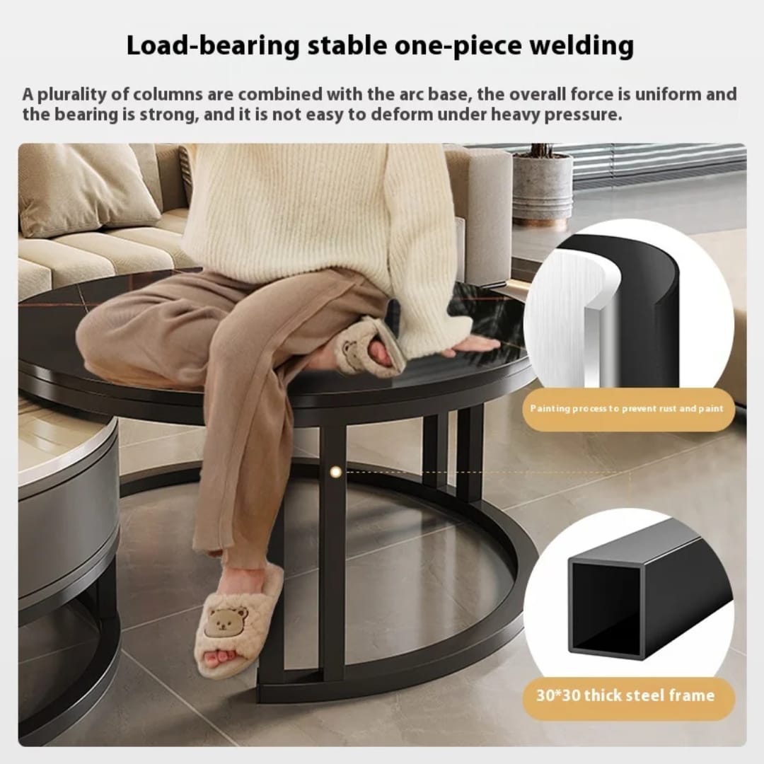 Round black coffee table in a living room setting with text about load-bearing stability.