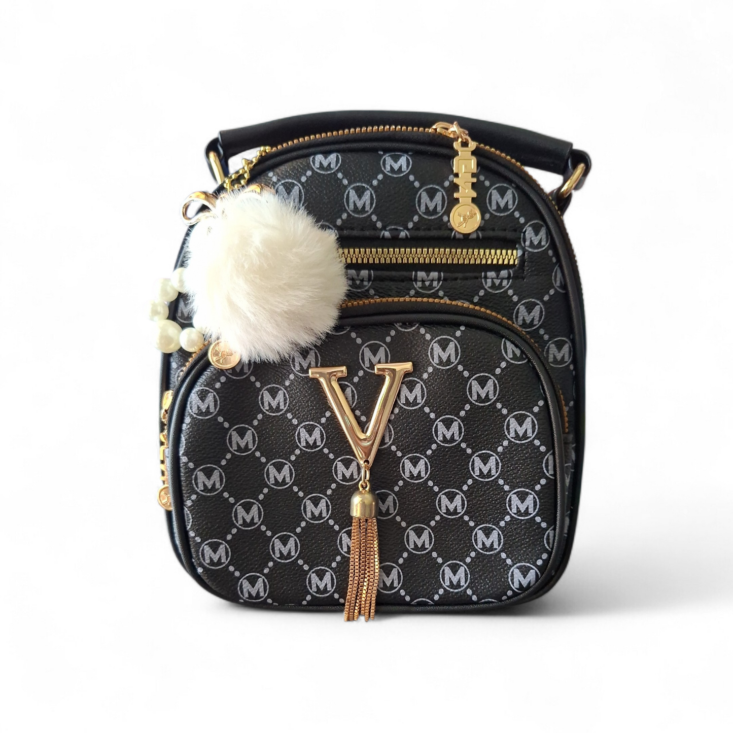 Black handbag with gold accents and white pom-pom on a white background