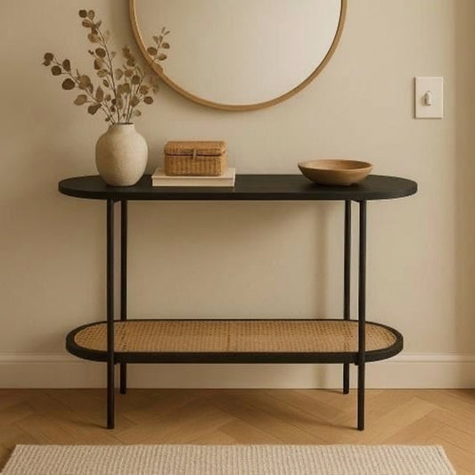 Console table with decorative items against a beige wall
