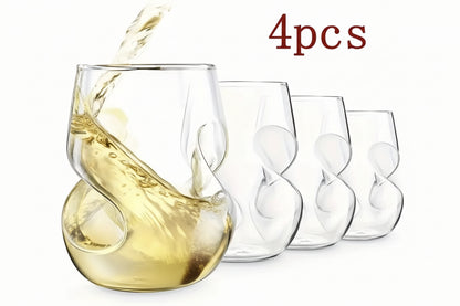 Set of four clear wine glasses with swirling design, one being filled with white wine.