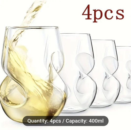 Set of four clear wine glasses with swirling design, one being filled with white wine.