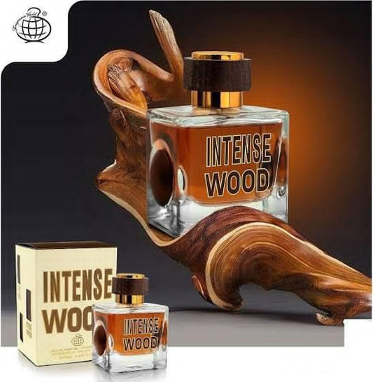 Perfume bottle and packaging labeled 'Intense Wood' on a dark background