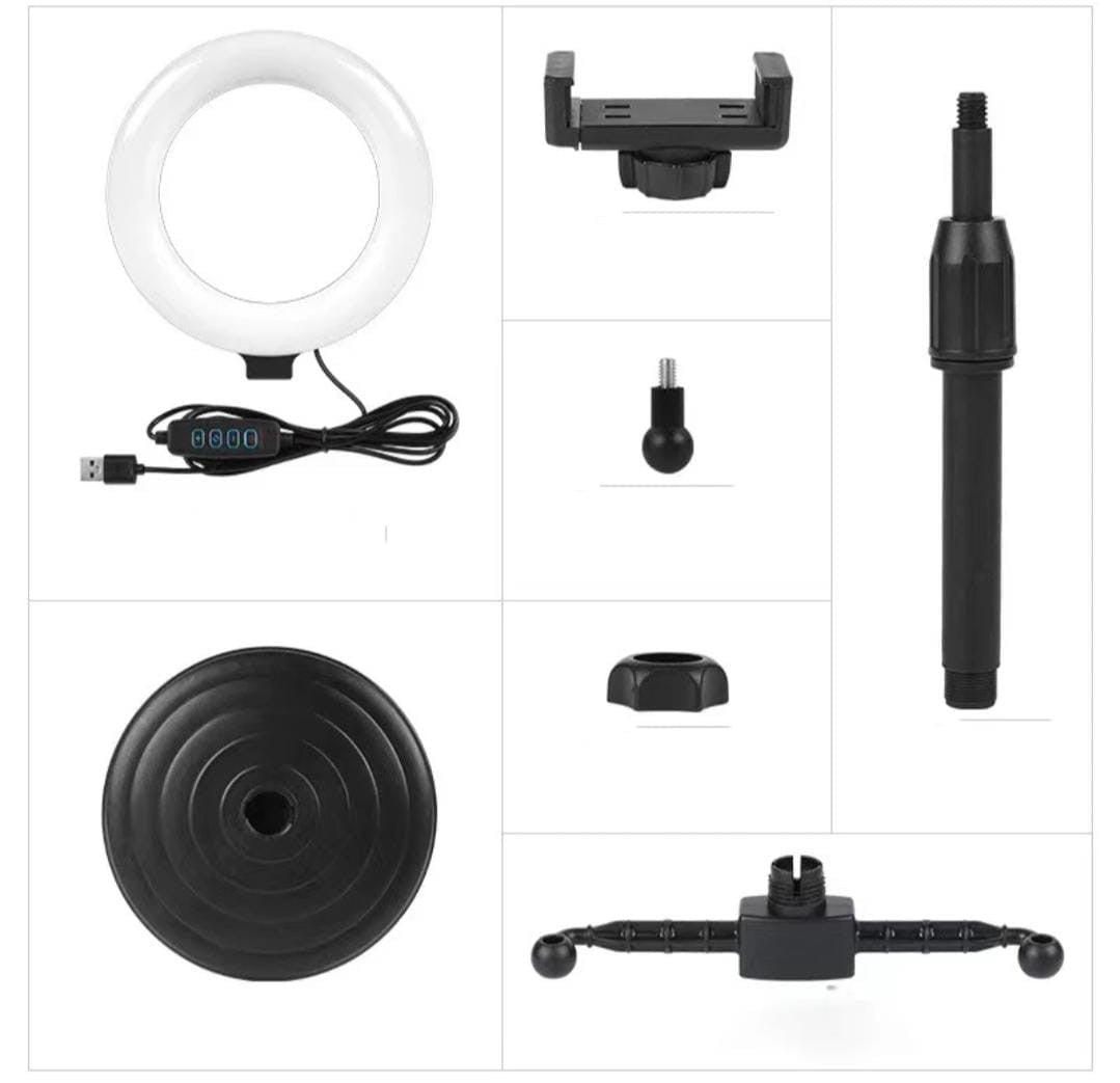 Collection of photography accessories including a ring light, phone holder, and various attachments on a white background.