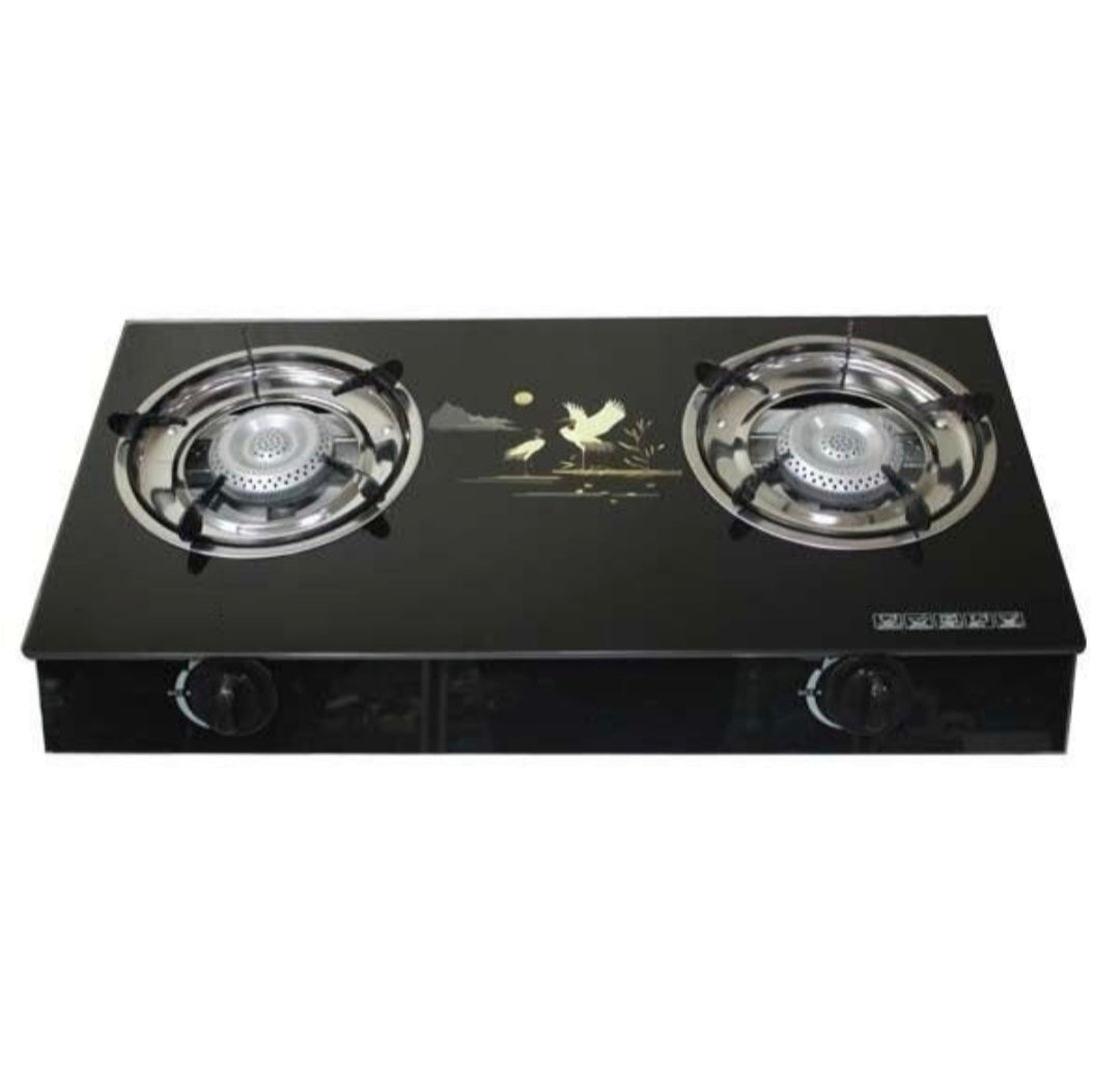 Black glass gas stove with two burners on a white background